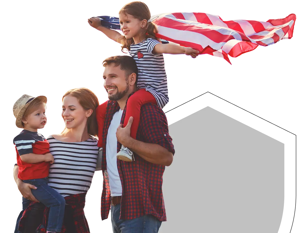 Couple with two kids holding usa flag
