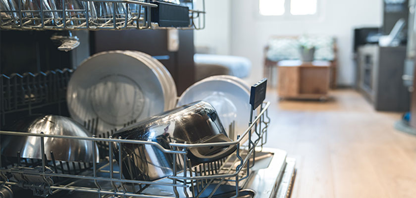 Dishwasher not draining? Try these 5 troubleshooting tips and learn about dishwasher home warranties for greater peace of mind. | SHW Blog