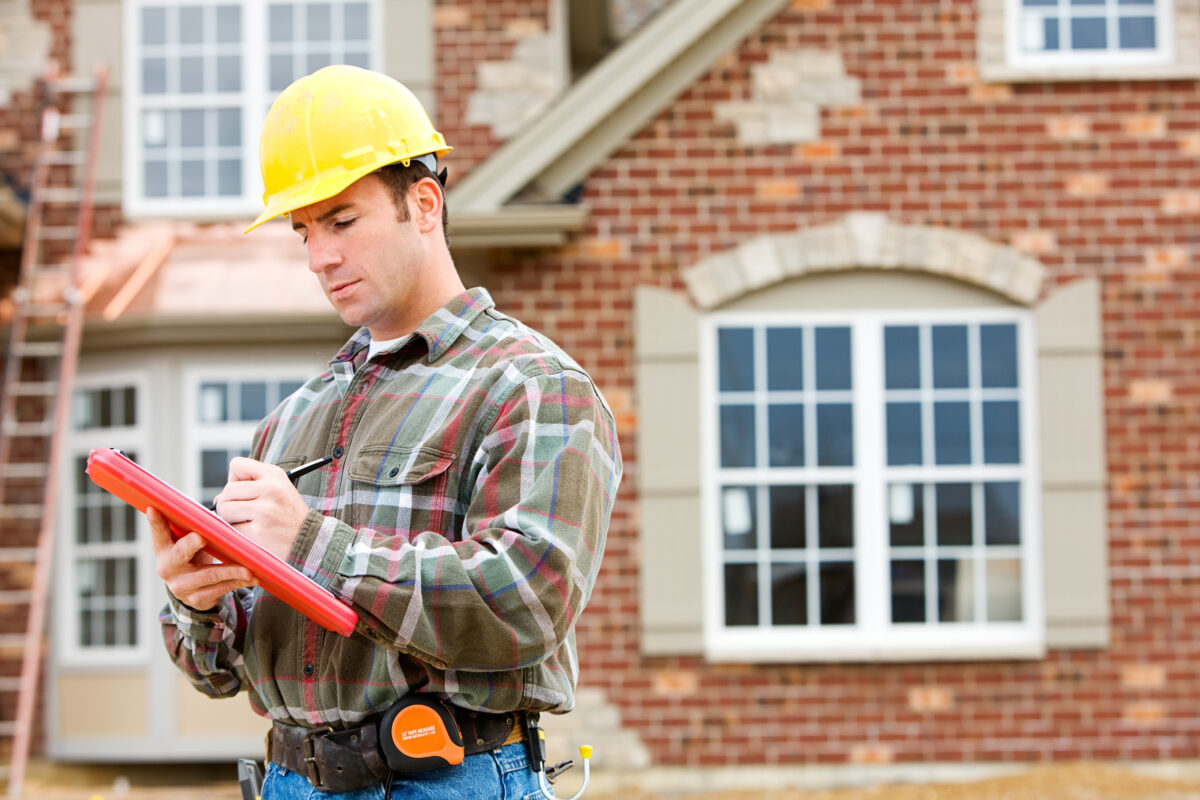 Home Inspector Completing Inspection Report | SHW Blog