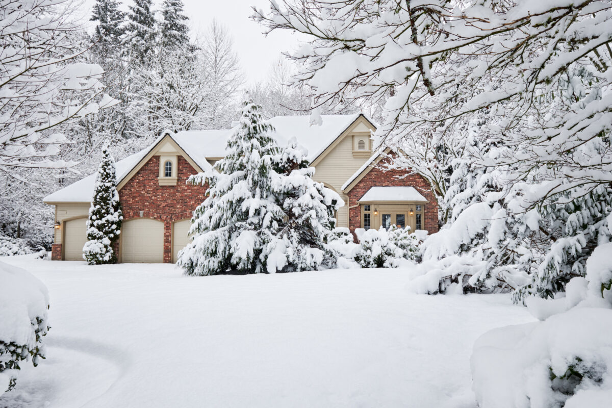 Suburban home in the snow | SHW Blog