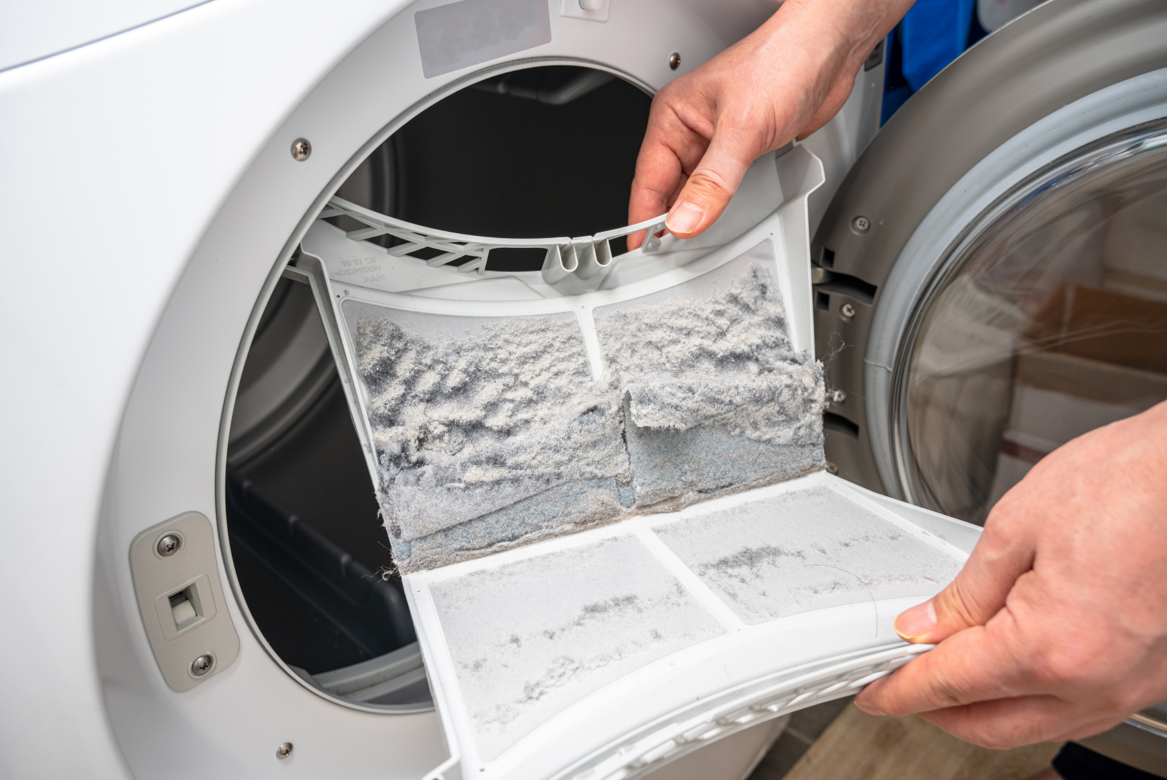 Cleaning clothes dryer lint filter. | SHW Blog