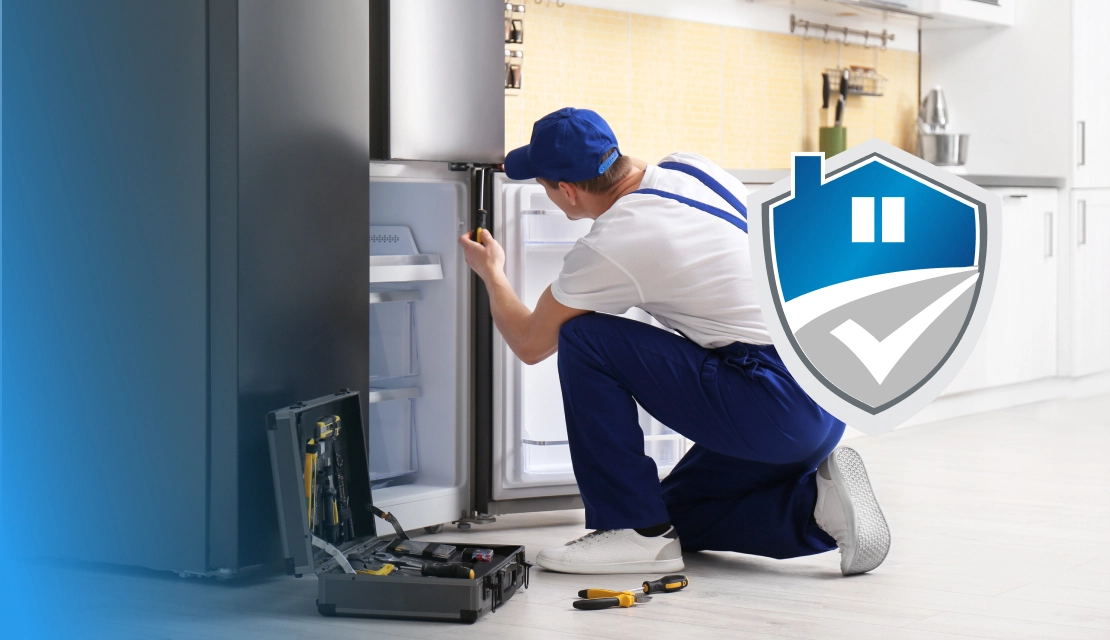 Refrigeratior-fixing-by-technician-under-home-warranty